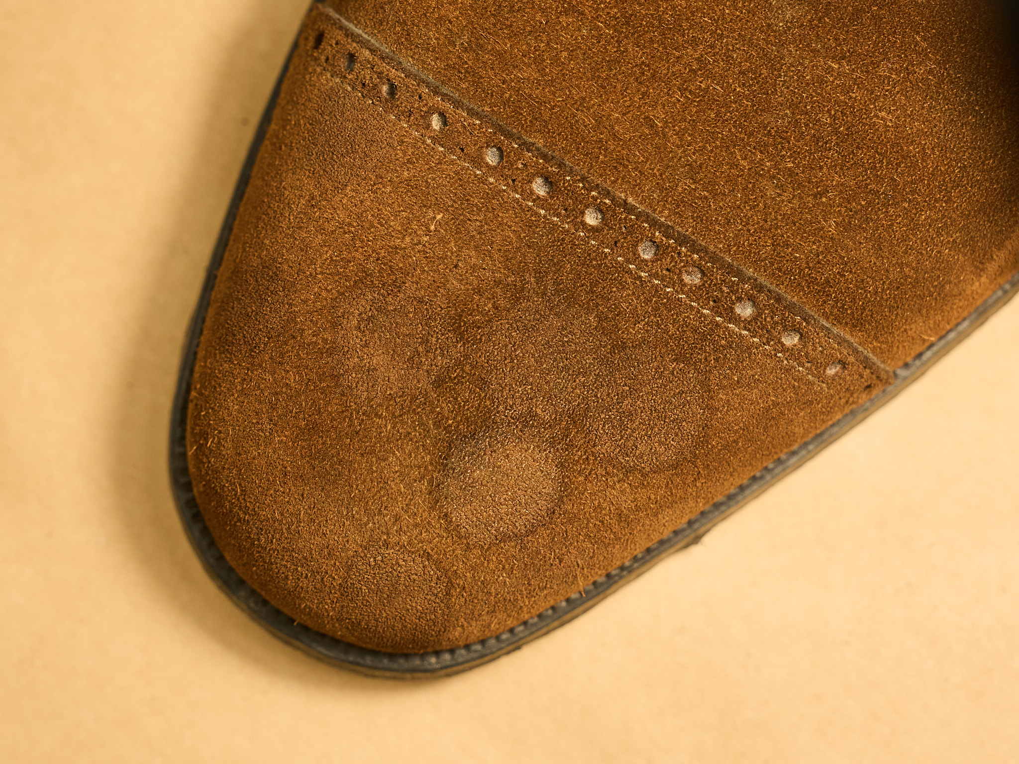 Water stains on a suede shoe